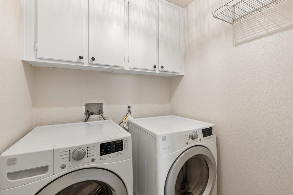 3183 Dehesa Road, Unit 19 El Cajon, CA 92019 - Photo 19 of 26 a utility room with dryer and washer