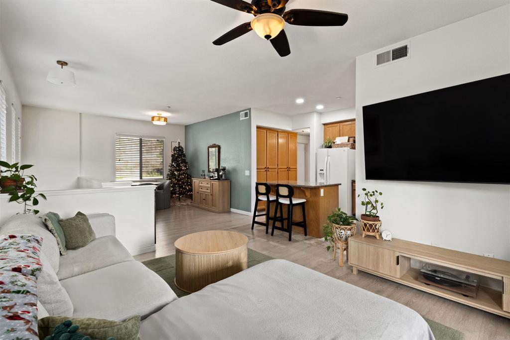 3183 Dehesa Road, Unit 19 El Cajon, CA 92019 - Photo 6 of 26 a living room with furniture and a flat screen tv