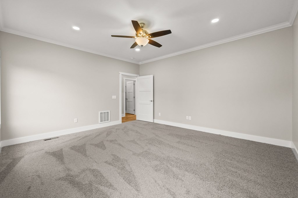 4595 Window Cliff Road Baxter, TN 38544 - Photo 14 of 30 an empty room with closet and ceiling fan