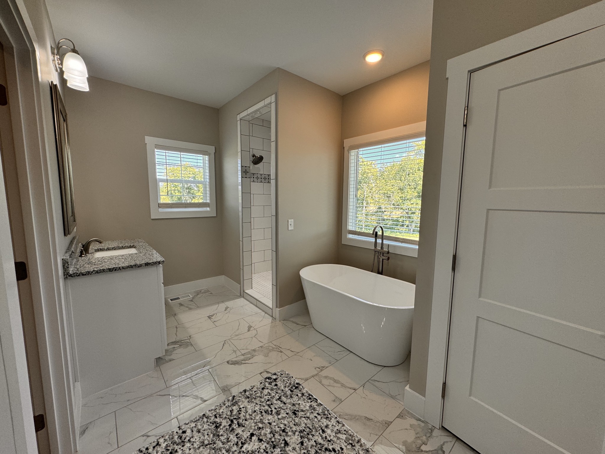 4595 Window Cliff Road Baxter, TN 38544 - Photo 17 of 30 a bathroom with a toilet a sink and bathtub