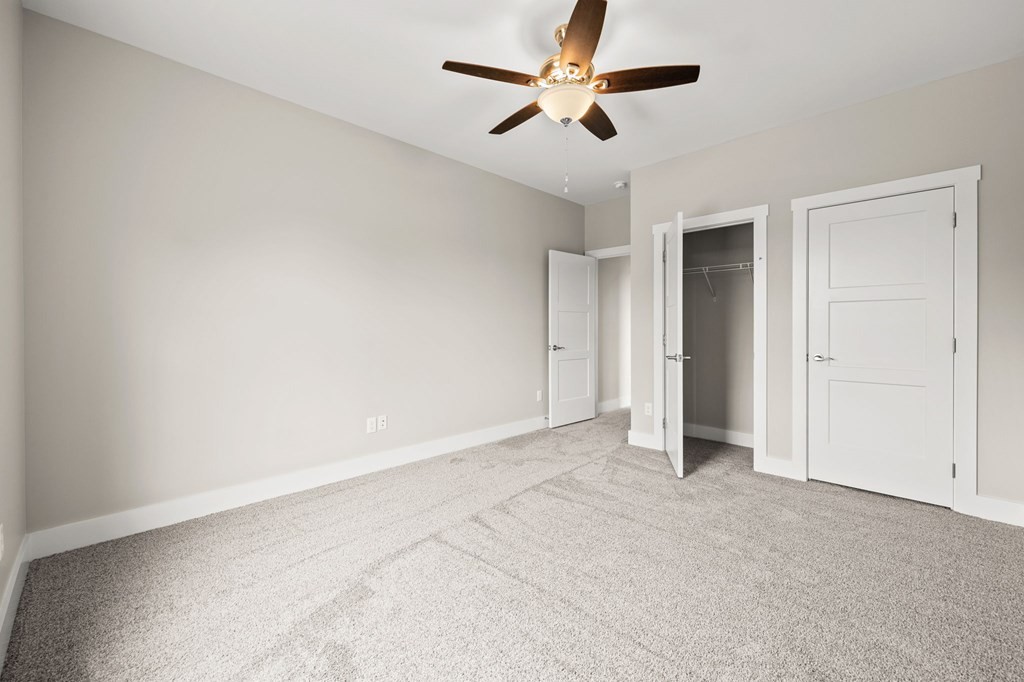 4595 Window Cliff Road Baxter, TN 38544 - Photo 23 of 30 an empty room with ceiling fan and window