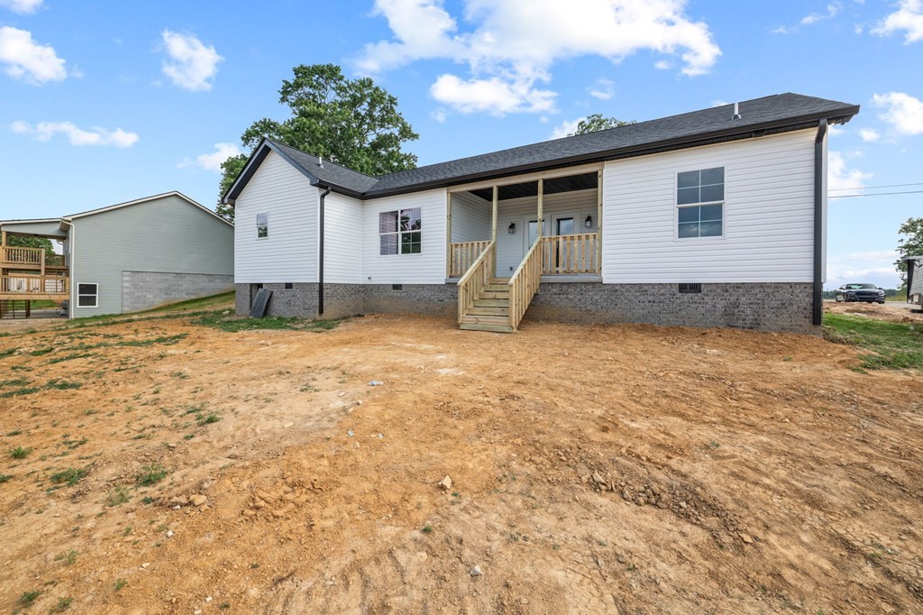 4595 Window Cliff Road Baxter, TN 38544 - Photo 29 of 30 a view of a house with a yard