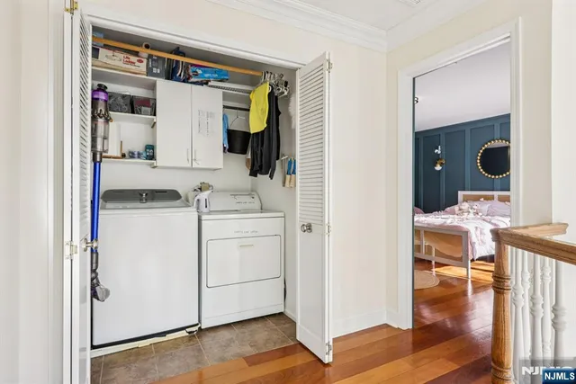 a view of living room with washer and dryer
