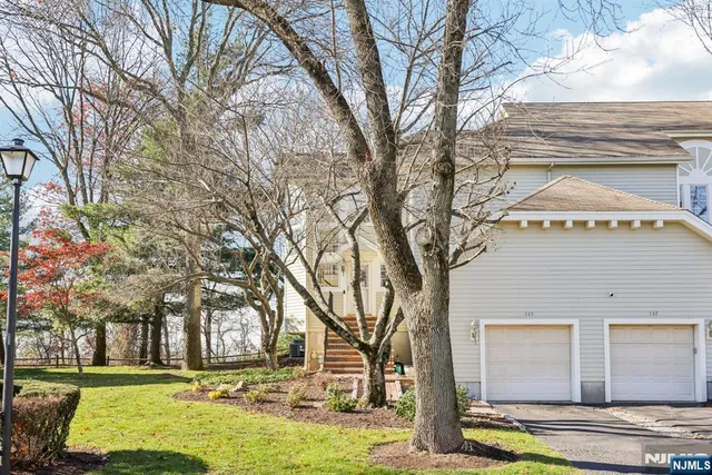 a view of a building with trees around