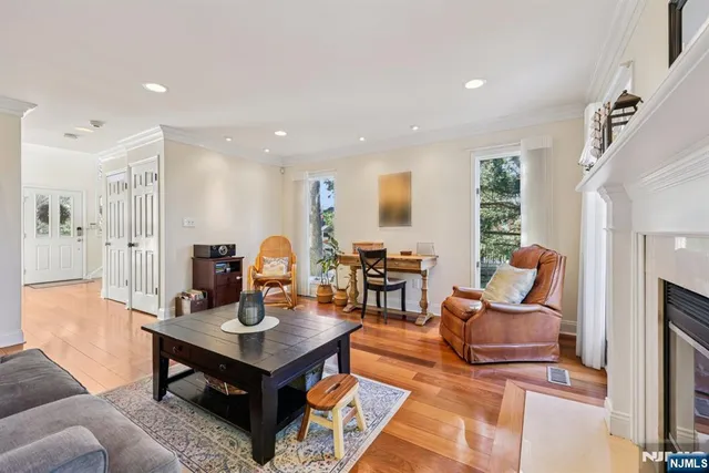 a living room with furniture and a table