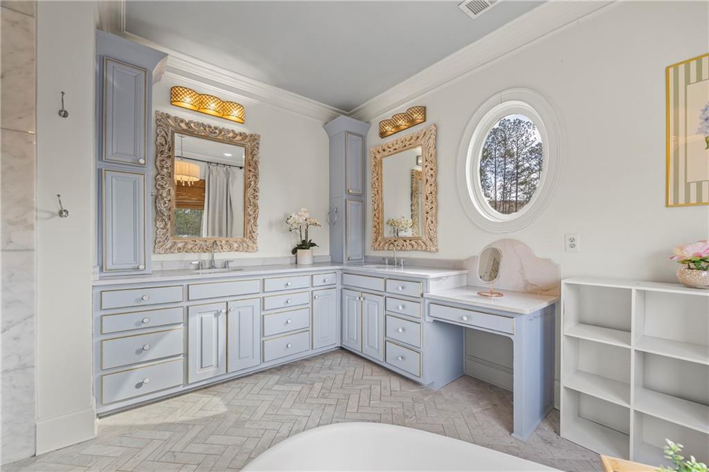 2668 New Hope Road Dacula, GA 30019 - Photo 20 of 65 a en suite bathroom with a granite countertop sink and a large mirror