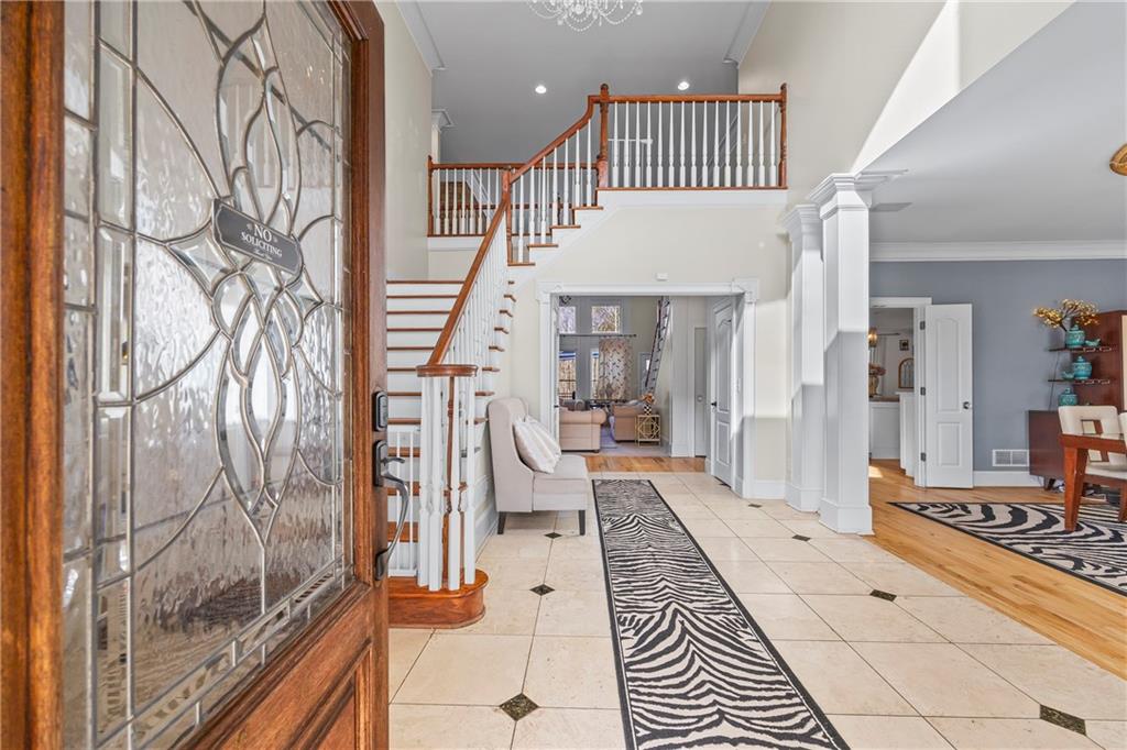 2668 New Hope Road Dacula, GA 30019 - Photo 2 of 65 a very nice looking room with a large window and a rug