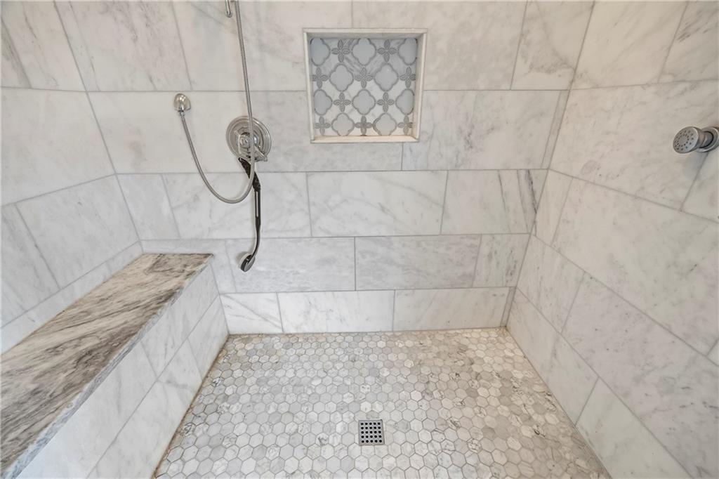 2668 New Hope Road Dacula, GA 30019 - Photo 22 of 65 a bathroom with a bathtub