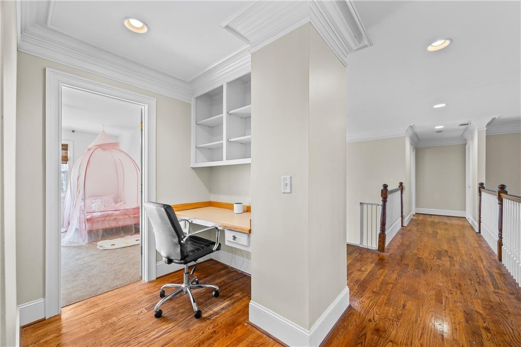 2668 New Hope Road Dacula, GA 30019 - Photo 27 of 65 a view of a workspace with furniture and wooden floor