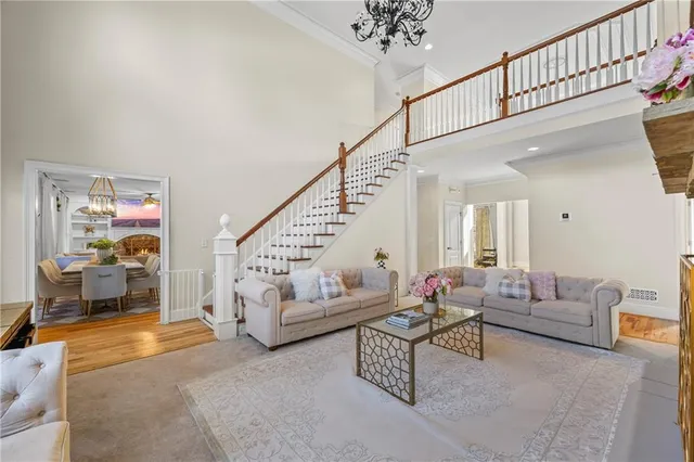 a living room with furniture and white walls