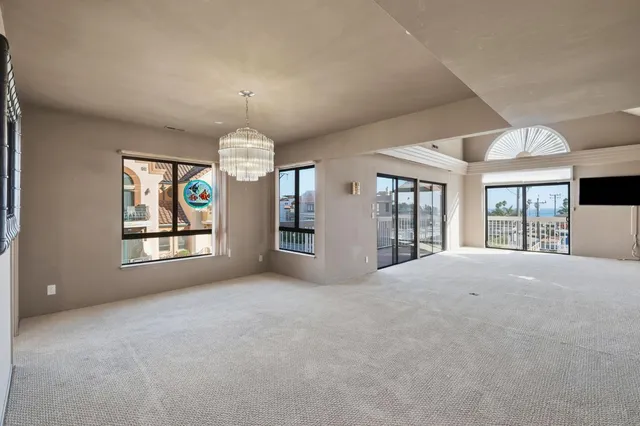 a view of an empty room and window