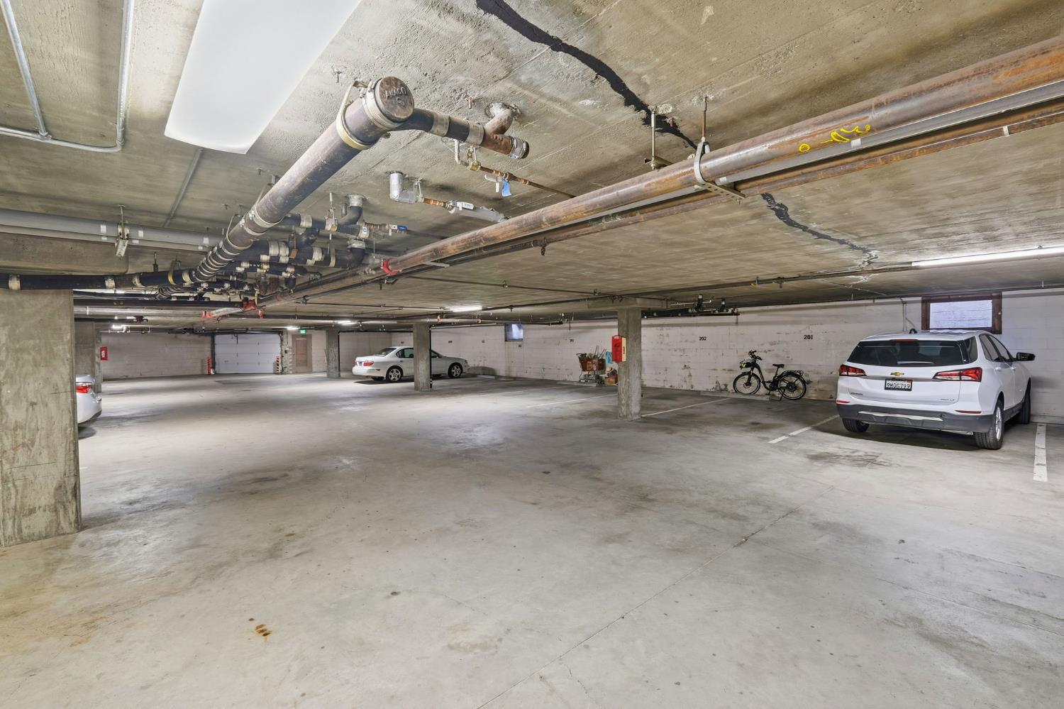 526 Second Street, Unit 301 Santa Cruz, CA 95060 - Photo 46 of 49 Enclosed secured garage - 2 allocated owner spots. Guest parking inside and out.