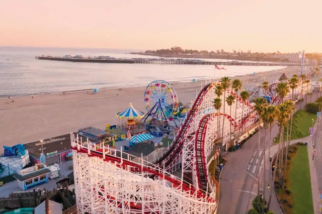 a view of a lake with boats and trees in the background