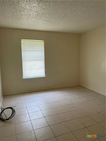 a view of a room with a window