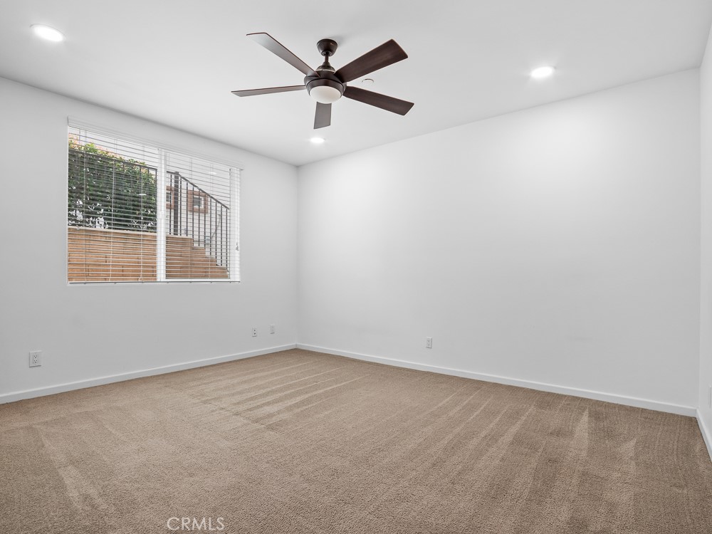568 Vía Pueblo Riverside, CA 92507 - Photo 16 of 46 Down stairs bedroom with private bath and walk in closet.