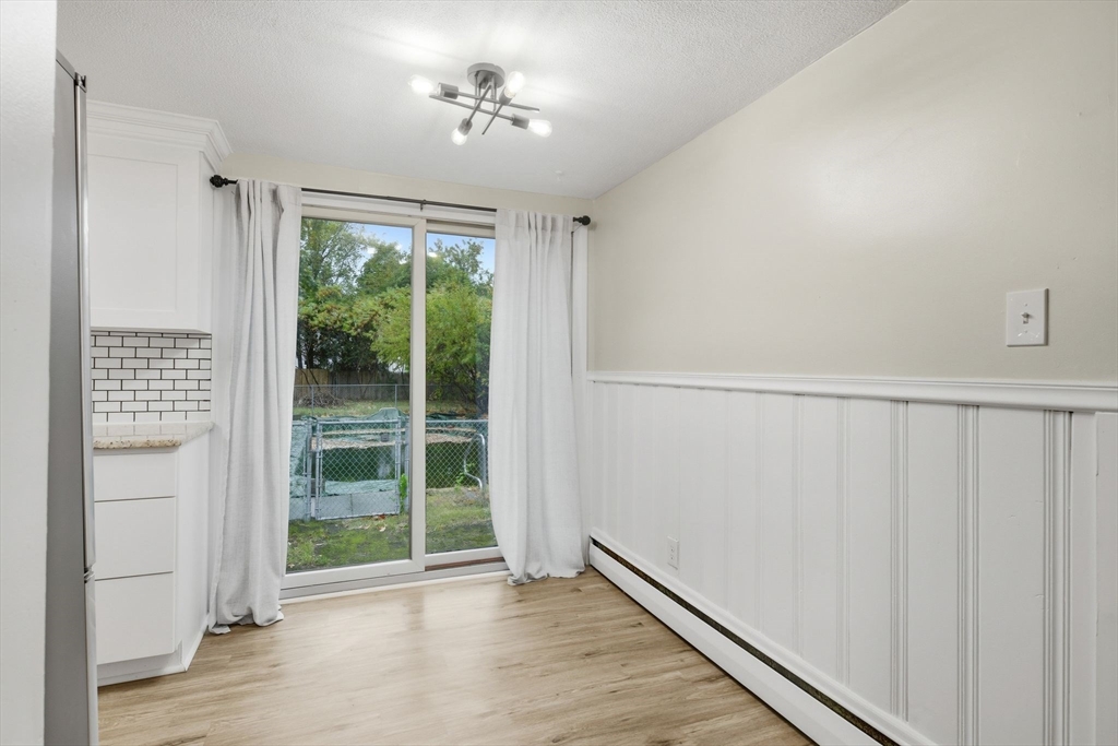 150 Drexel Street Springfield, MA 01104 - Photo 16 of 27 a view of an empty room with a window