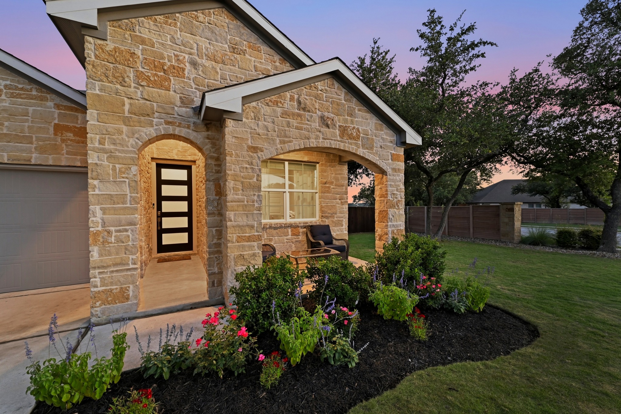 4420 Ingram Road Georgetown, TX 78628 - Photo 3 of 40 A welcoming stone facade with a covered porch offers inviting curb appeal.