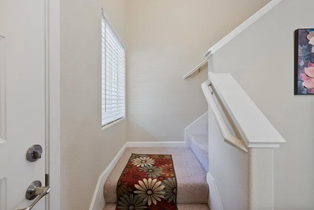 a view of entryway with a front door
