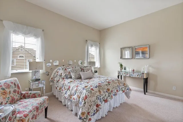 a bedroom with a bed and furniture