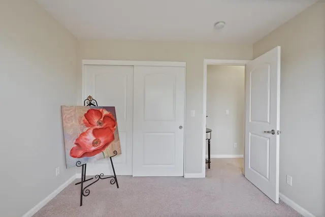 a room with cabinet and a table