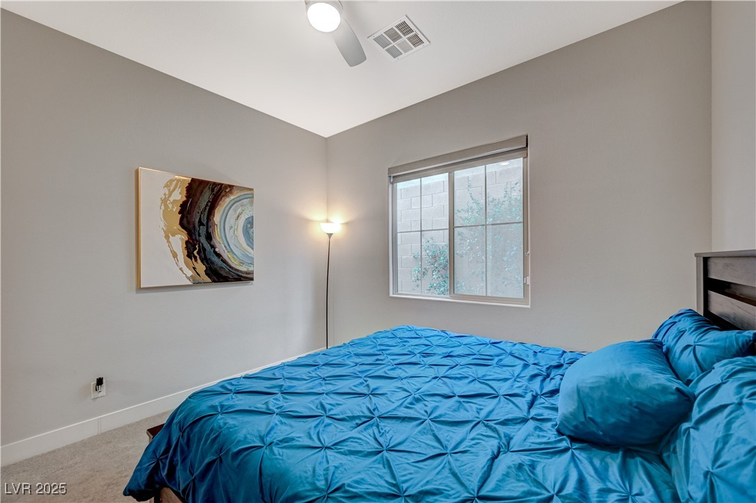 3943 Reyes Avenue Las Vegas, NV 89141 - Photo 24 of 93 Bedroom with carpet and ceiling fan