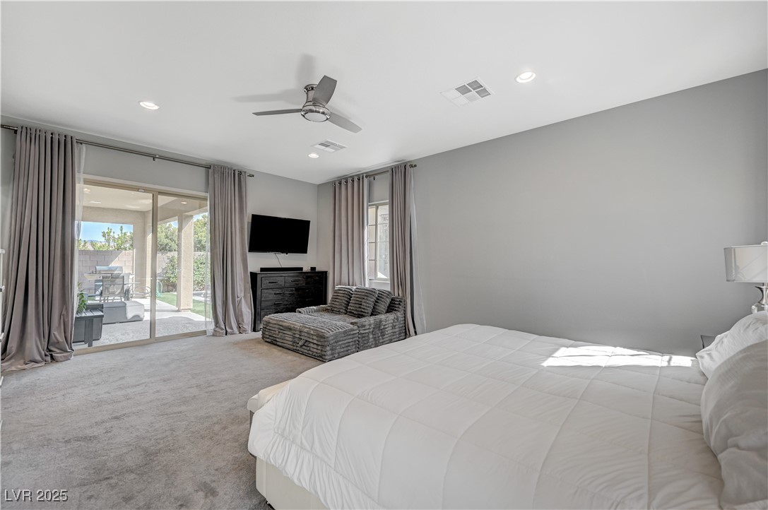 3943 Reyes Avenue Las Vegas, NV 89141 - Photo 35 of 93 Bedroom with carpet floors, access to exterior, recessed lighting, and ceiling fan