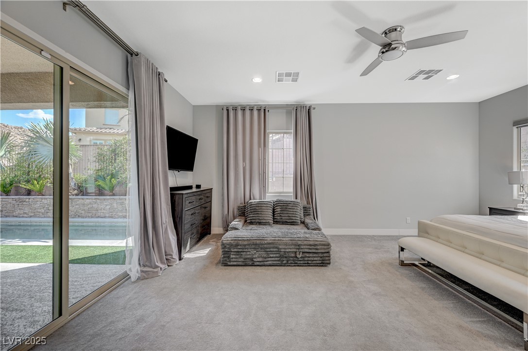 3943 Reyes Avenue Las Vegas, NV 89141 - Photo 37 of 93 Bedroom featuring access to outside, light carpet, ceiling fan, and recessed lighting