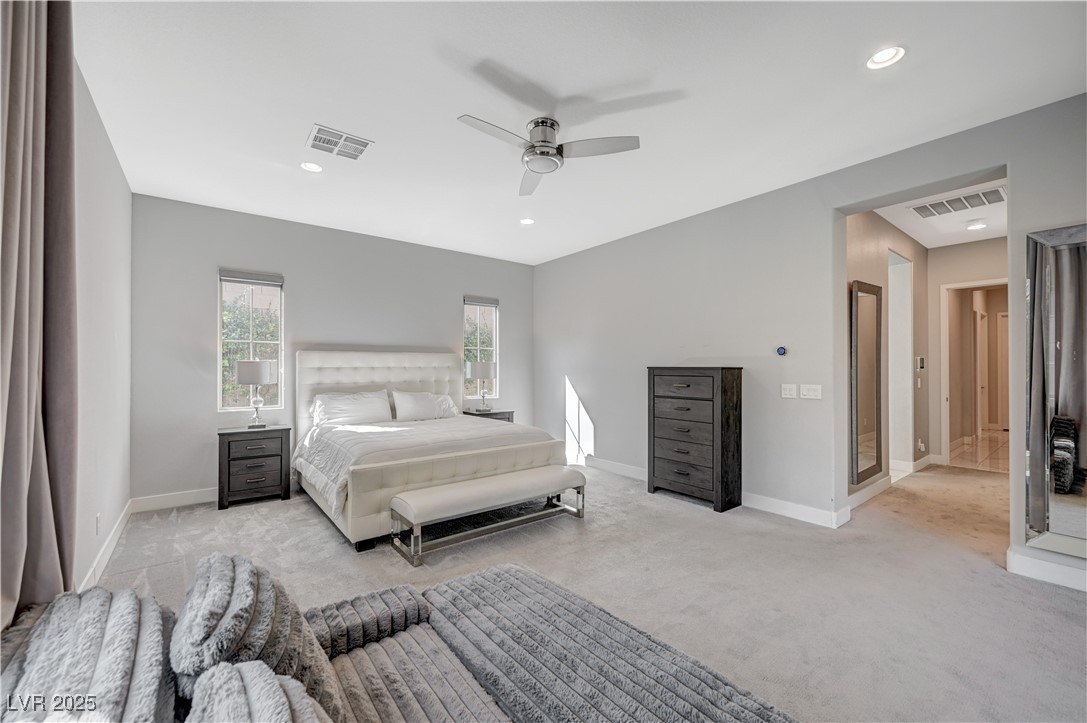 3943 Reyes Avenue Las Vegas, NV 89141 - Photo 38 of 93 Bedroom featuring light carpet, a ceiling fan, and recessed lighting