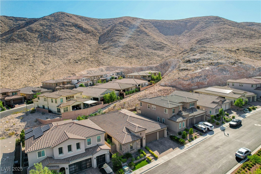 3943 Reyes Avenue Las Vegas, NV 89141 - Photo 61 of 93 Aerial perspective of suburban area with mountains