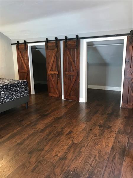 1124 Brabec Street Pittsburgh, PA 15212 - Photo 6 of 11 wooden floor in an empty room