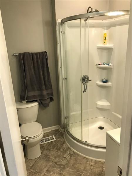 1124 Brabec Street Pittsburgh, PA 15212 - Photo 8 of 11 a bathroom with a toilet and a shower