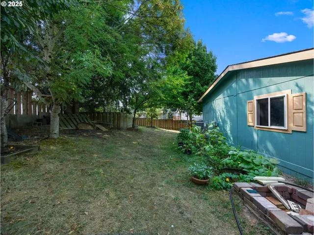 a backyard of a house with lots of green space