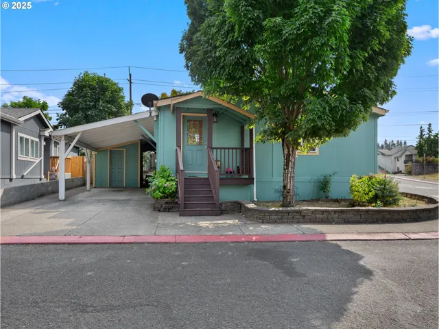 a front view of a house with garage