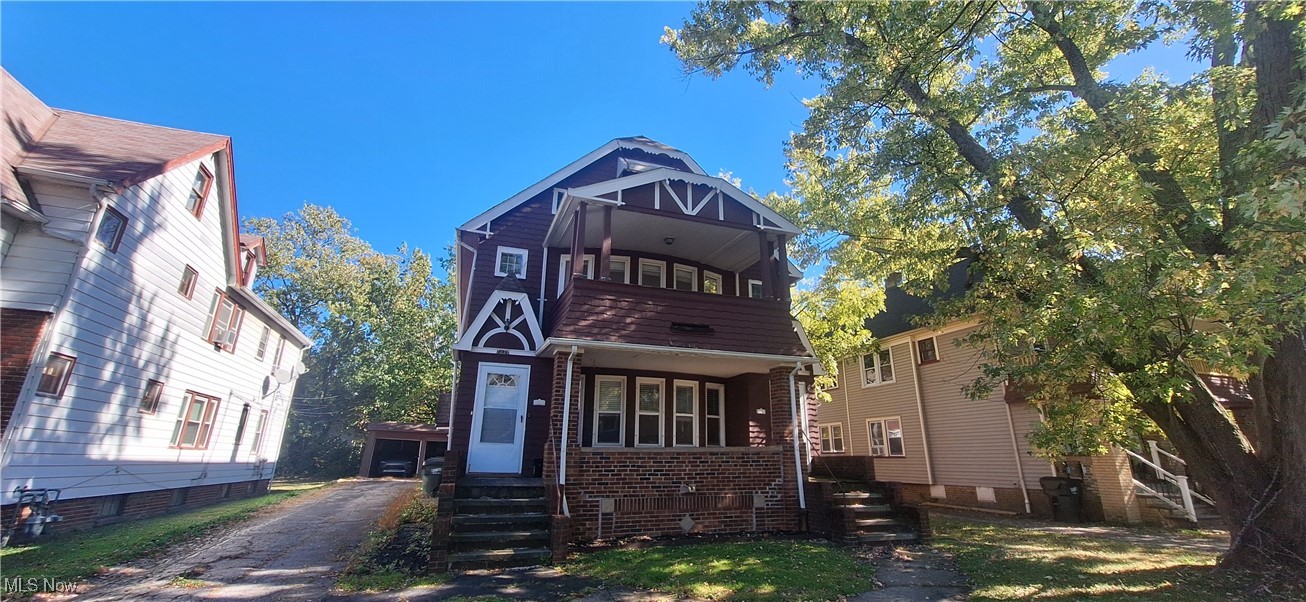 1477 Genesee Road South Euclid, OH 44121 - Photo 1 of 26 View of front of home with a balcony and brick siding