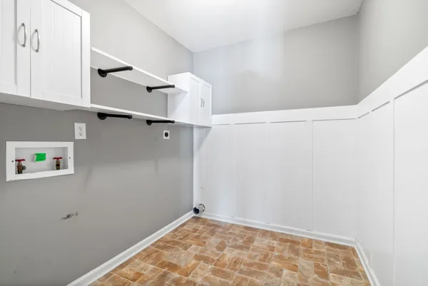 a view of small space with racks on the wall