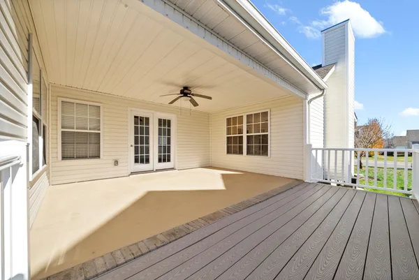 a view of a house with wooden floor and windows
