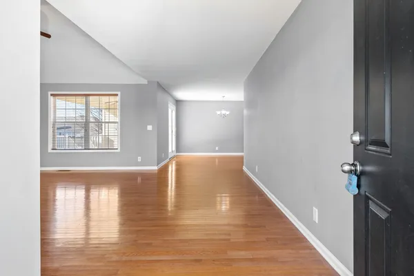 a view of an empty room and window
