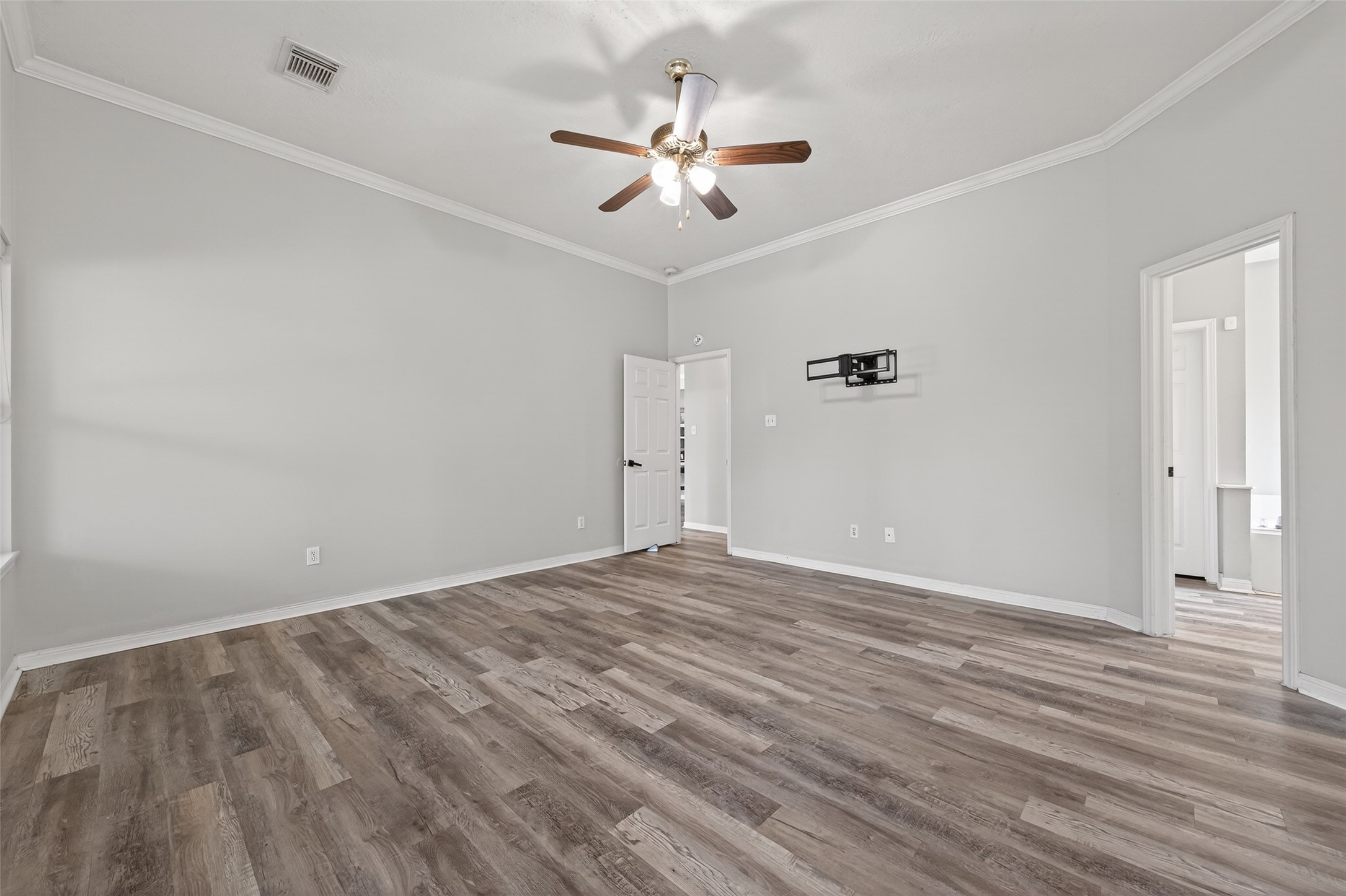 16902 Canyon Ridge Drive Spring, TX 77379 - Photo 22 of 43 an empty room with fan and a ceiling fan