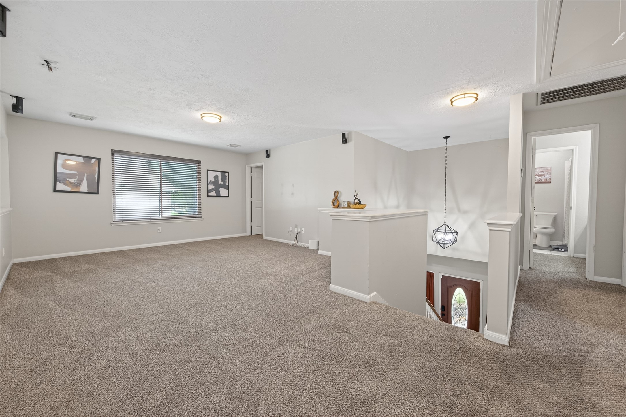 16902 Canyon Ridge Drive Spring, TX 77379 - Photo 27 of 43 a view of a kitchen with refrigerator and cabinets