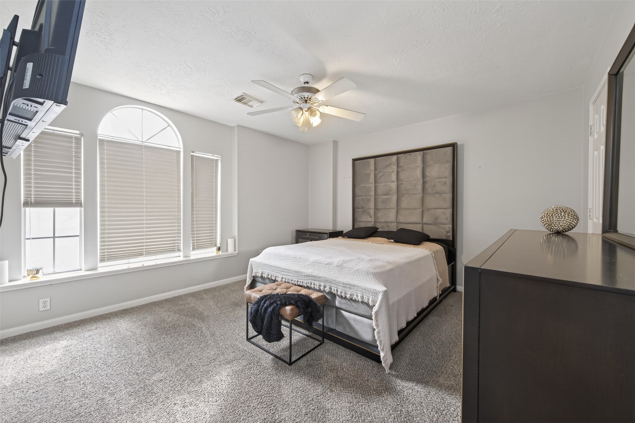 16902 Canyon Ridge Drive Spring, TX 77379 - Photo 34 of 43 a spacious bedroom with a bed and a window