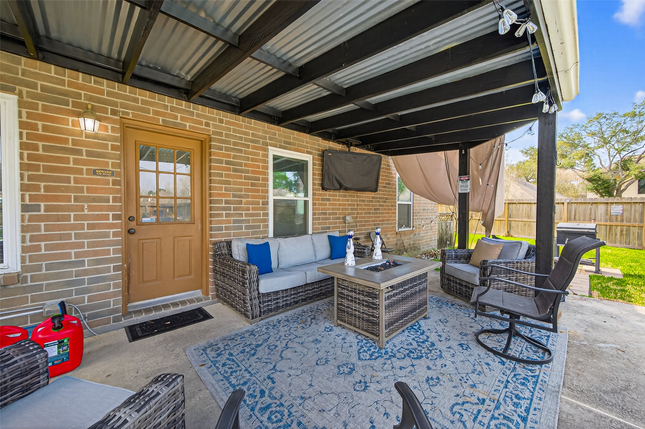 16902 Canyon Ridge Drive Spring, TX 77379 - Photo 40 of 43 a outdoor living space with patio furniture and a potted plant
