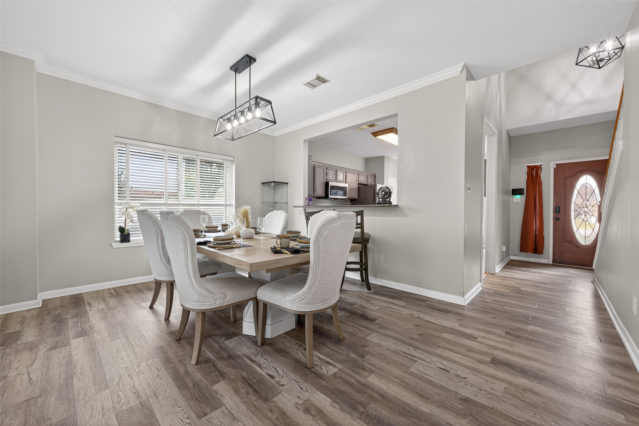 16902 Canyon Ridge Drive Spring, TX 77379 - Photo 4 of 43 a view of a dining room with furniture window and wooden floor