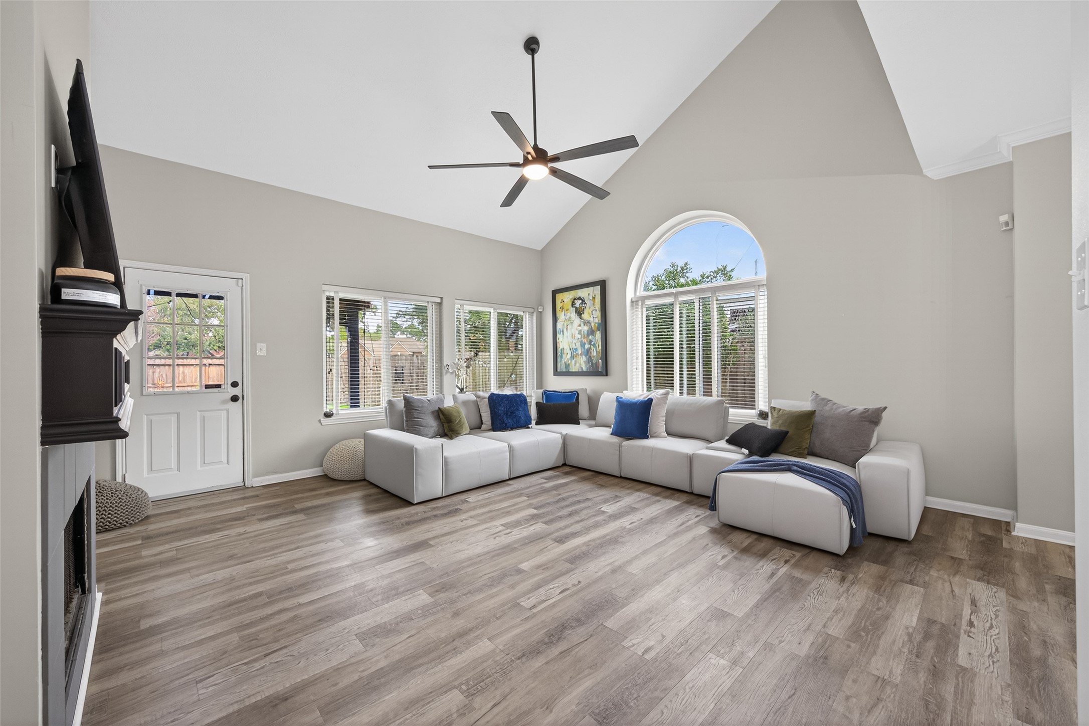 16902 Canyon Ridge Drive Spring, TX 77379 - Photo 7 of 43 a living room with furniture fireplace and flat screen tv