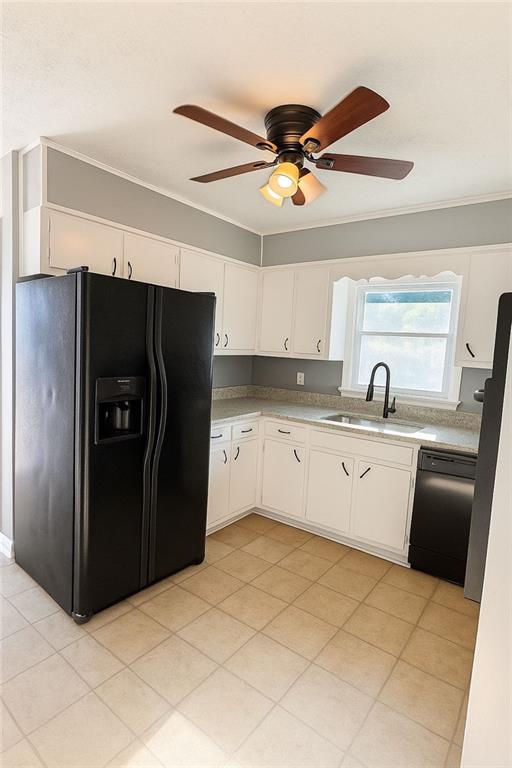 4500 Cemetery Street Powder Springs, GA 30127 - Photo 2 of 6 a kitchen with stainless steel appliances a refrigerator sink and cabinets