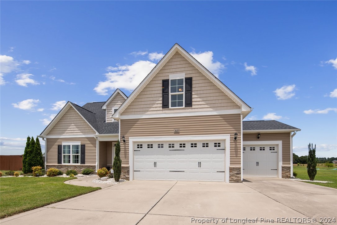 3631 Thrower Road Hope Mills, NC 28348 - Photo 4 of 50 a view of a house with a yard