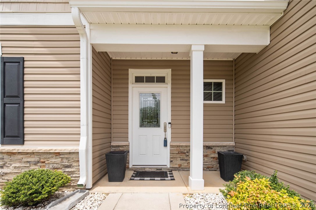 3631 Thrower Road Hope Mills, NC 28348 - Photo 8 of 50 a view of a entryway front of house