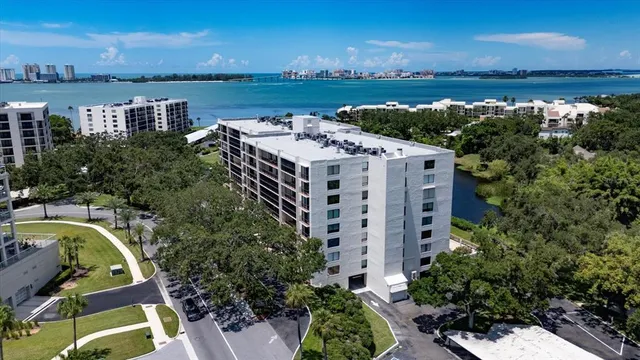 a view of a lake with a city skyline in the background