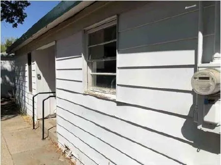 a view of a house with a car park