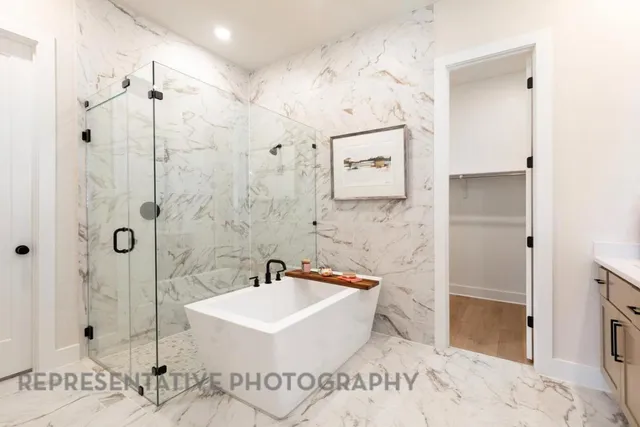 a bathroom with a sink a mirror and a shower