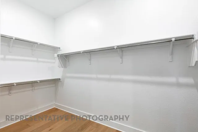 a view of a room with racks on the wall